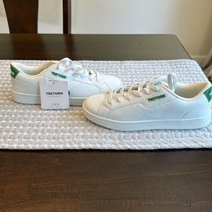 Brand new with tags Tretorn white tennis shoes.